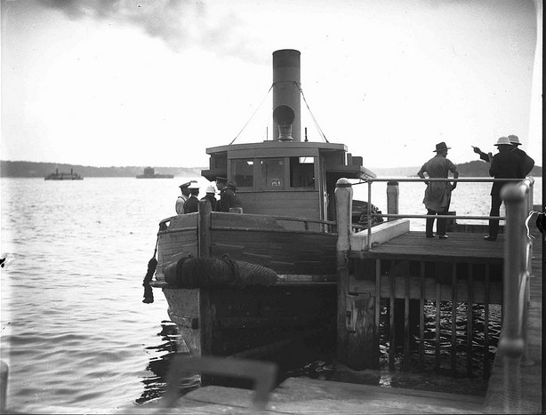 Tug docked at a wharf in Bradleys Head